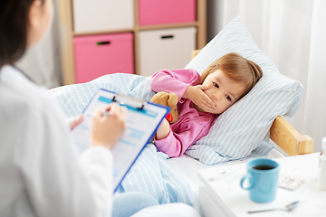 Image showing doctor and ill coughing little girl in bed at home