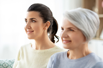 Image showing portrait of old mother and adult daughter at home