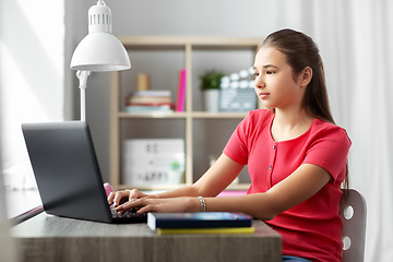 Image showing student girl with laptop computer learning at home