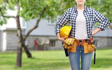 Image showing woman or builder with helmet and working tools