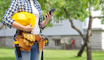 Image showing woman or builder with phone and working tools