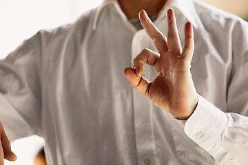 Image showing Close up of caucasian male hands, working in office, business, people