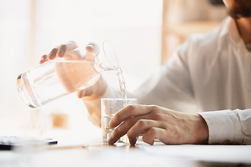 Image showing Close up of caucasian male hands, working in office, business, people