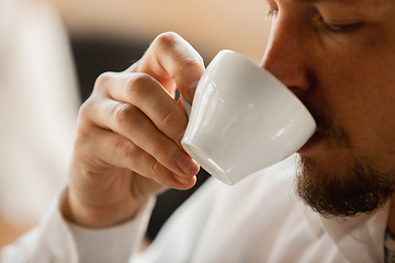 Image showing Close up of caucasian male hands, working in office, business, people