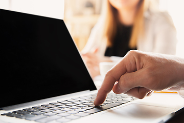 Image showing Close up of caucasian male hands, working in office, business, people