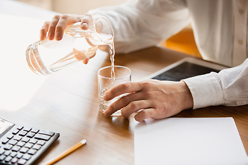 Image showing Close up of caucasian male hands, working in office, business, people