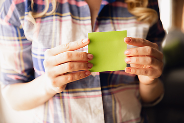 Image showing Close up of caucasian female hands during working in office, studying