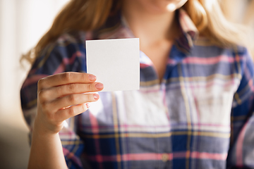 Image showing Close up of caucasian female hands during working in office, studying