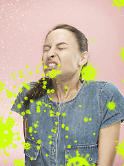 Image showing Caucasian woman sneezing, illustration of virus spreading, stop epidemic of coronavirus