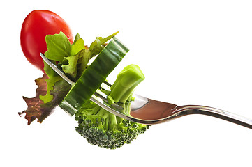Image showing Fresh vegetables on a fork