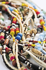 Image showing Wood and seashell bead necklaces