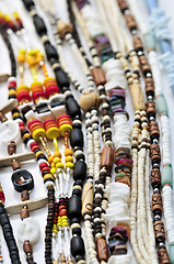 Image showing Wood and seashell bead necklaces