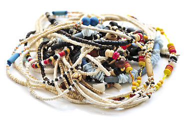 Image showing Wood and seashell bead necklaces