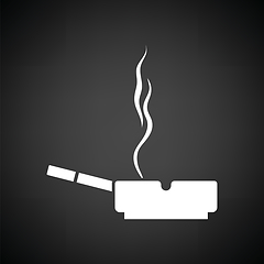 Image showing Cigarette in an ashtray icon