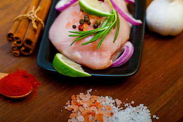 Image showing fresh organic chicken breast with herbs and spices