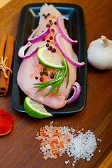 Image showing fresh organic chicken breast with herbs and spices