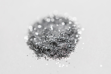 Image showing silver glitters on white background
