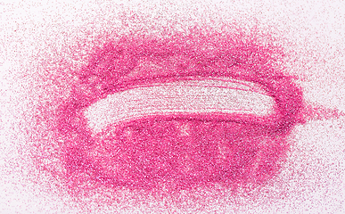 Image showing stroke on pink glitters on white background