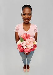 Image showing happy african american woman with bunch of flowers