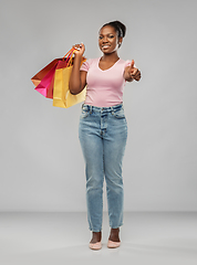 Image showing happy african american woman with shopping bags