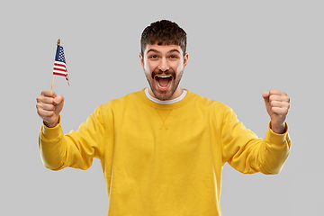 Image showing happy laughing man with flag of america