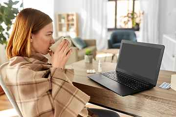 Image showing sick woman with tea having video call on laptop