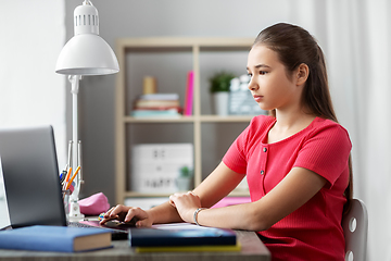 Image showing student girl with laptop computer learning at home