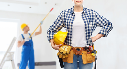 Image showing woman or builder with helmet and working tools