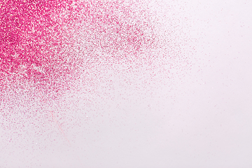 Image showing pink glitters on white background