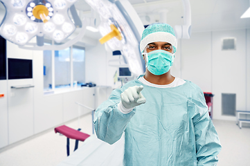 Image showing indian male doctor or surgeon over operating room