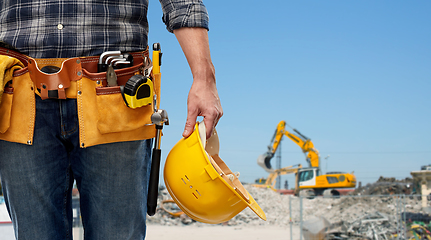 Image showing worker or builder with helmet and working tools