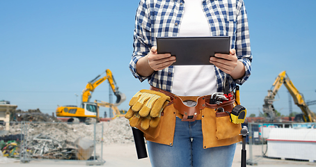 Image showing woman or builder with tablet pc and working tools