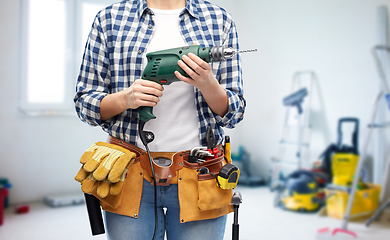Image showing woman or builder with drill and work tools