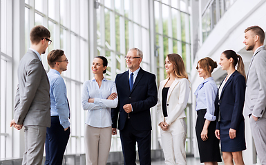 Image showing business people talking at office building