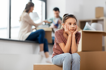 Image showing sad girl moving to new home with her family