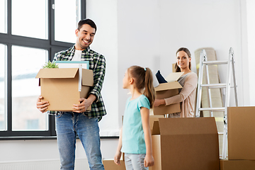 Image showing happy family with child moving to new home