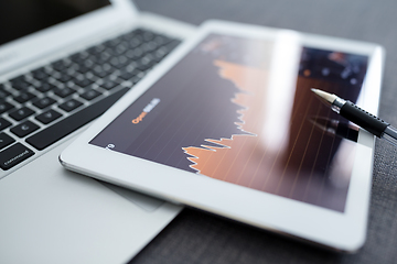 Image showing Digital stock market chart on a tablet screen