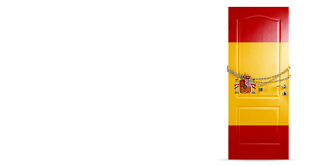 Image showing Door colored in Spain flag, locking with chain. Countries lockdown during coronavirus, COVID spreading