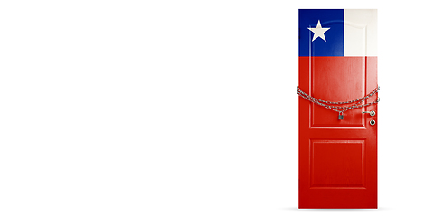Image showing Door colored in Chile flag, locking with chain. Countries lockdown during coronavirus, COVID spreading