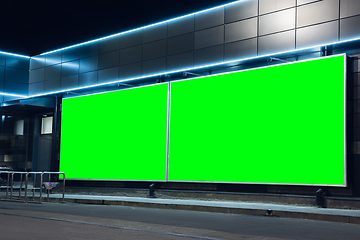 Image showing Blank citylight for advertising on the building at city night, copyspace for your text, image, design