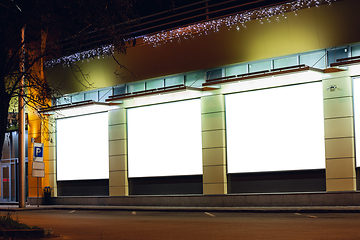 Image showing Blank citylight for advertising on the building at city night, copyspace for your text, image, design