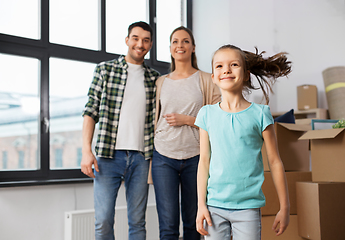 Image showing happy family with child moving to new home