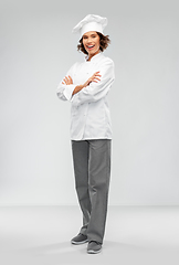 Image showing smiling female chef in toque