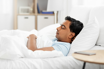 Image showing indian man sleeping in bed at home