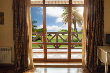 Image showing Closed window and beautiful picture outside, nature view, resort and resting