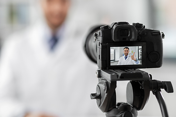 Image showing male doctor recording video blog at hospital