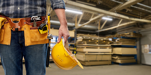 Image showing male worker with helmet and working tools