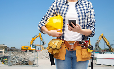 Image showing woman or builder with phone and working tools