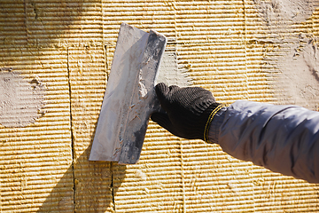 Image showing Close up of hand of repairman, professional builder working indoors, repairing