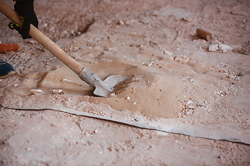 Image showing Close up of hand of repairman, professional builder working indoors, repairing